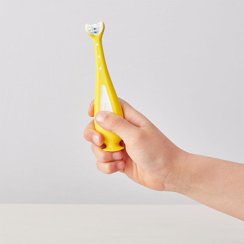 Brosse à dents pour bébé tri angle de Frida Baby